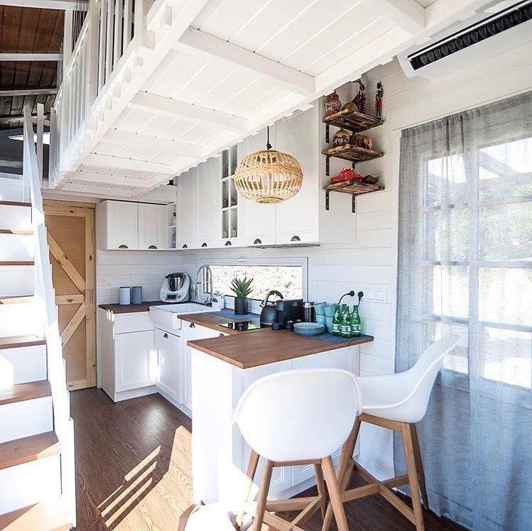 Sleek Modern Kitchen With Loft Stair Integration