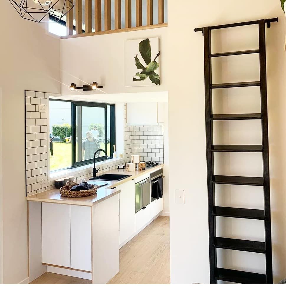 Sleek Modern Kitchen With Loft Stair Integration