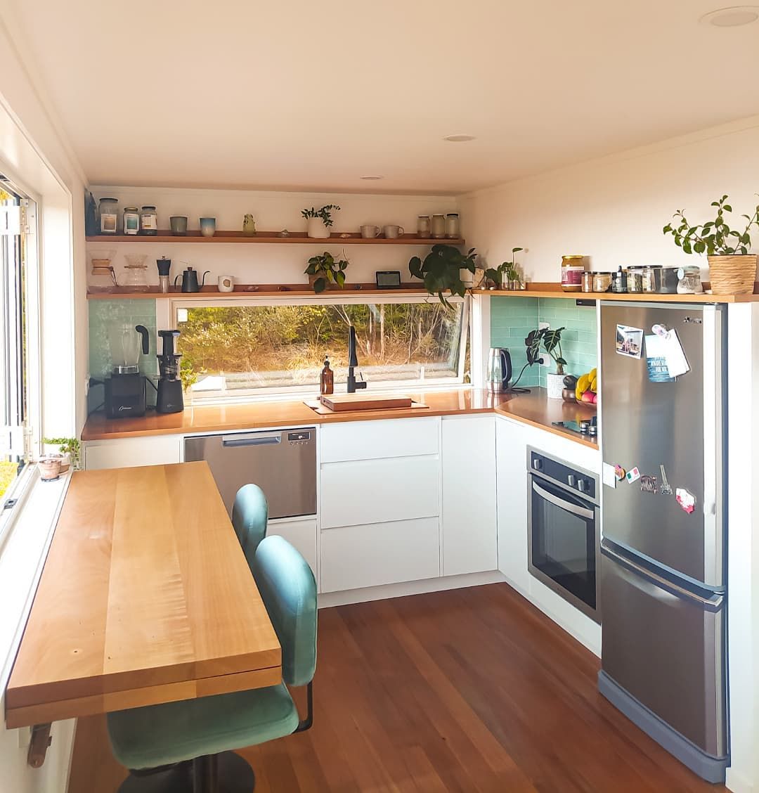 Sleek Modern Kitchen With Loft Stair Integration