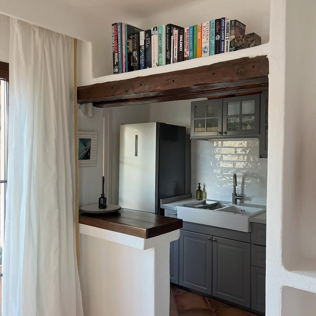 White Small Kitchen with a Simple Dining Corner Copy