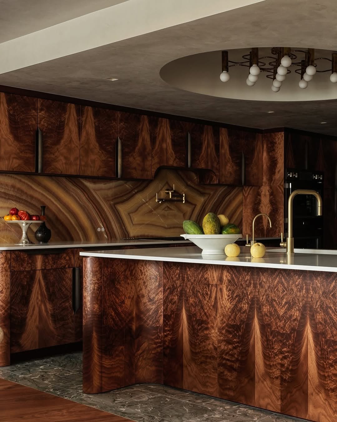 Luxurious Kitchen with Sculpted Wood and Stone Drama