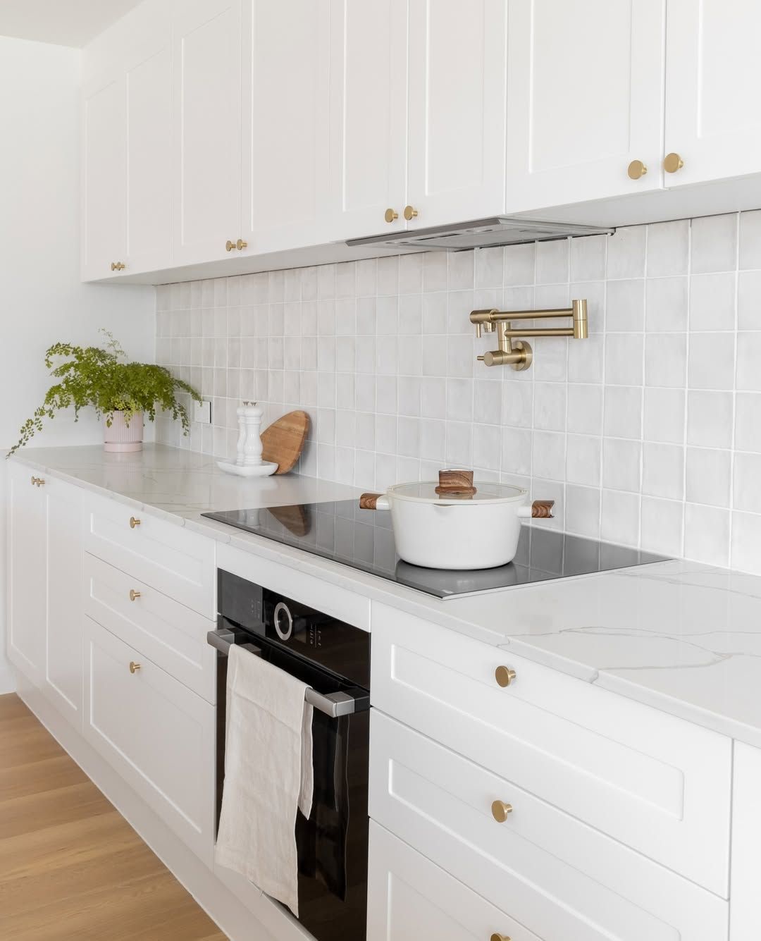 Elongated Tile With Brass Pot Filler