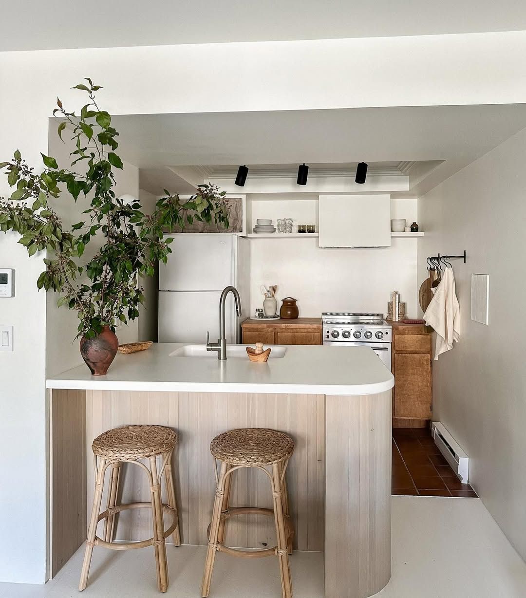 White Small Kitchen with a Simple Dining Corner Copy