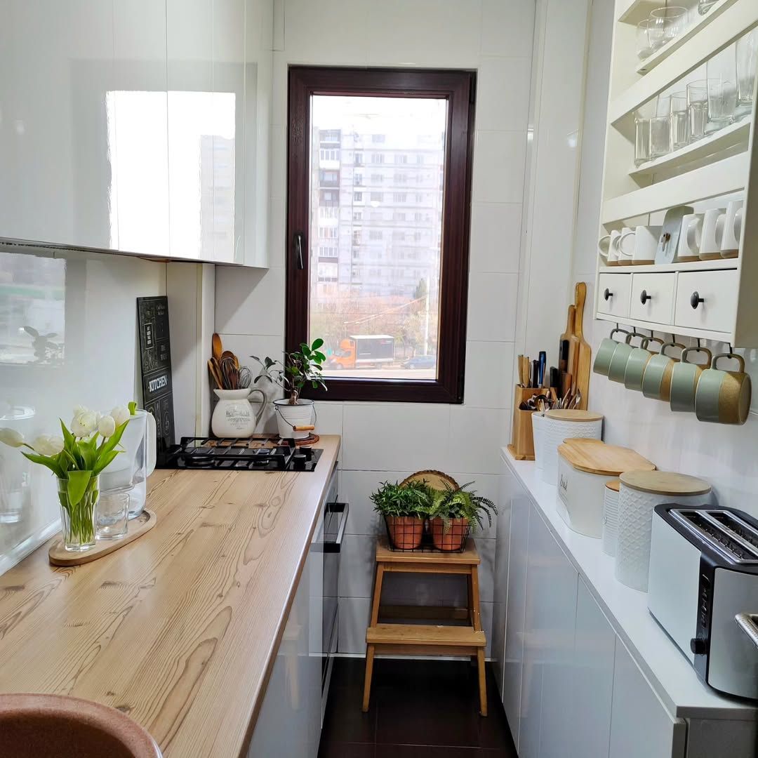 White Small Kitchen with a Simple Dining Corner Copy