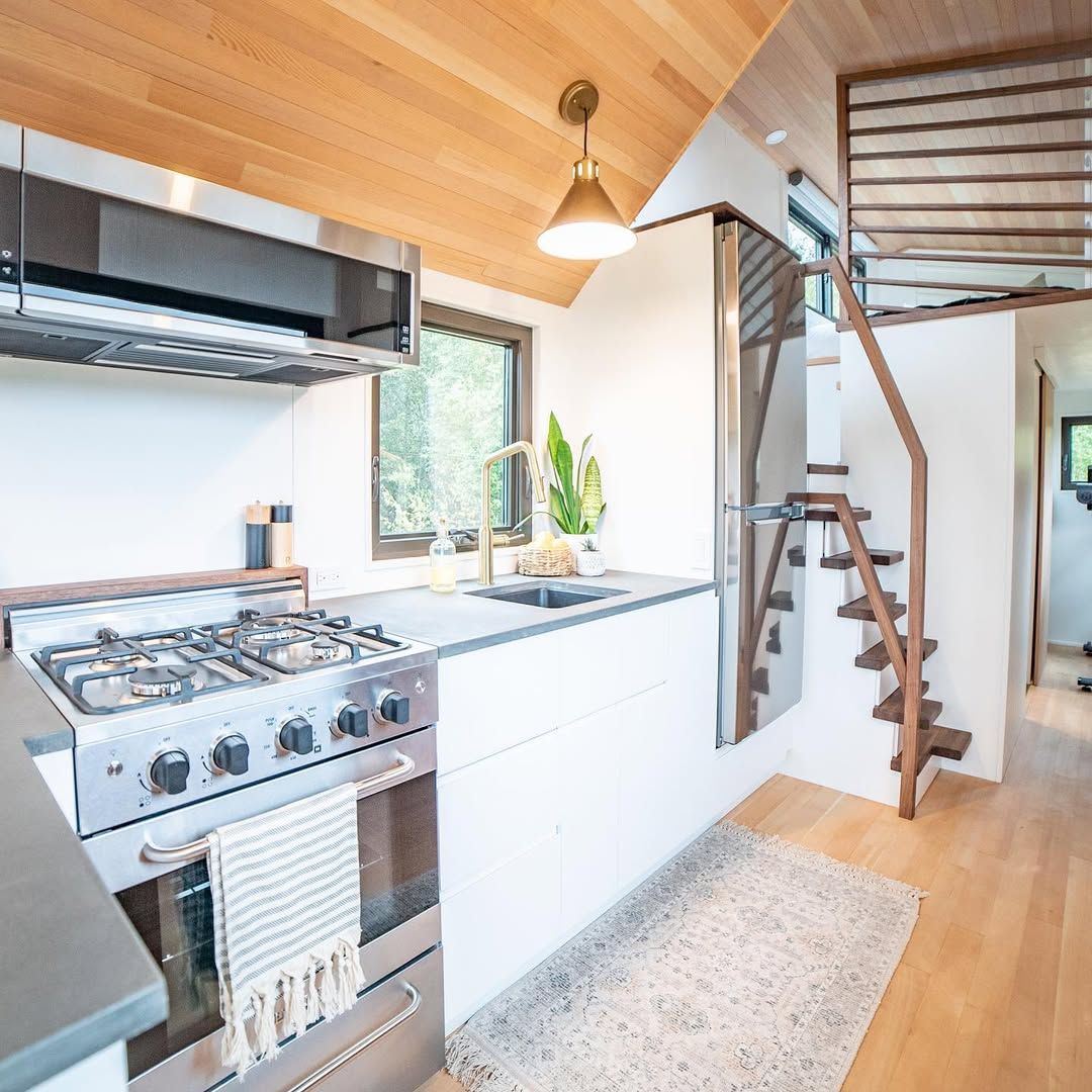 Sleek Modern Kitchen With Loft Stair Integration