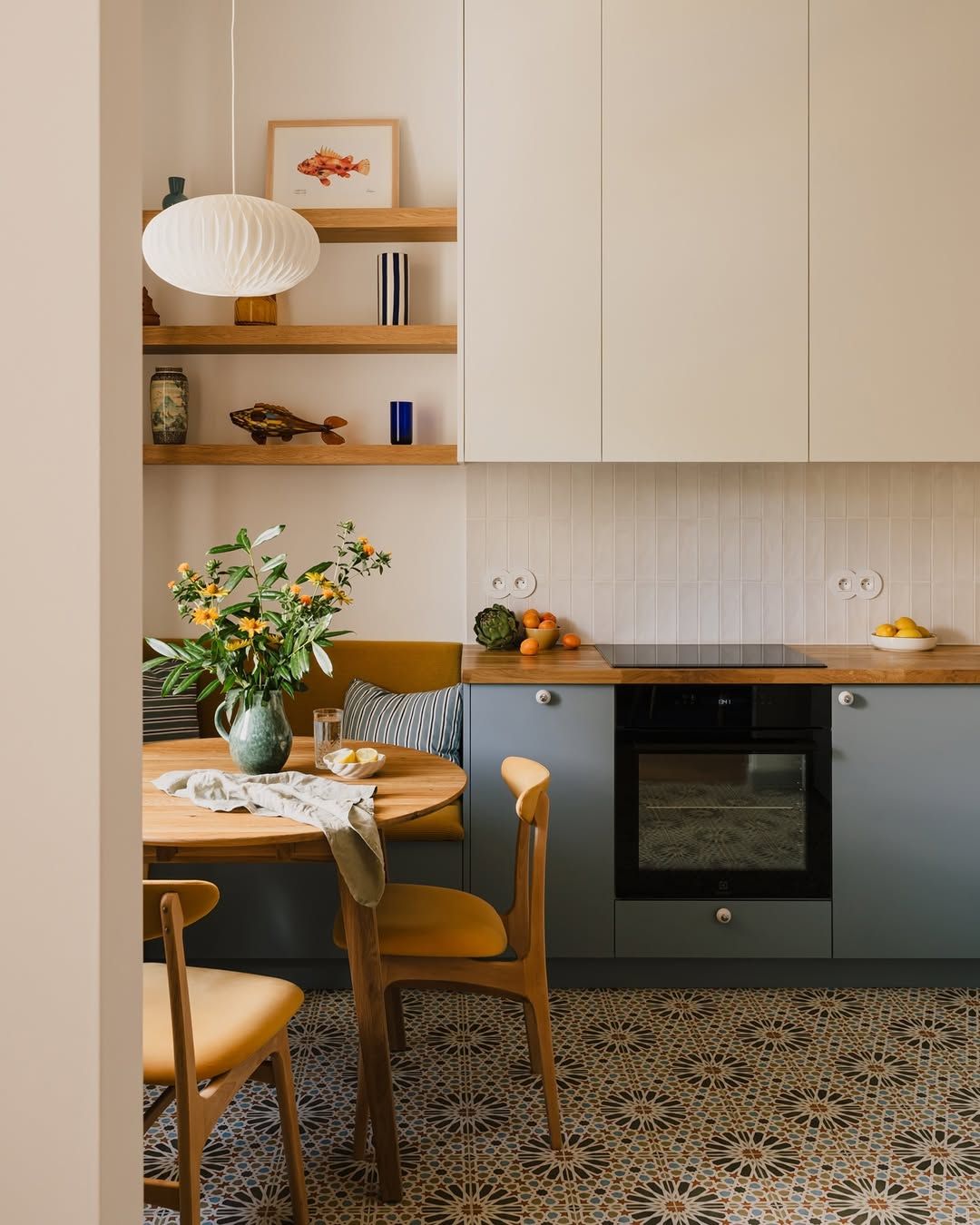 White Small Kitchen with a Simple Dining Corner Copy