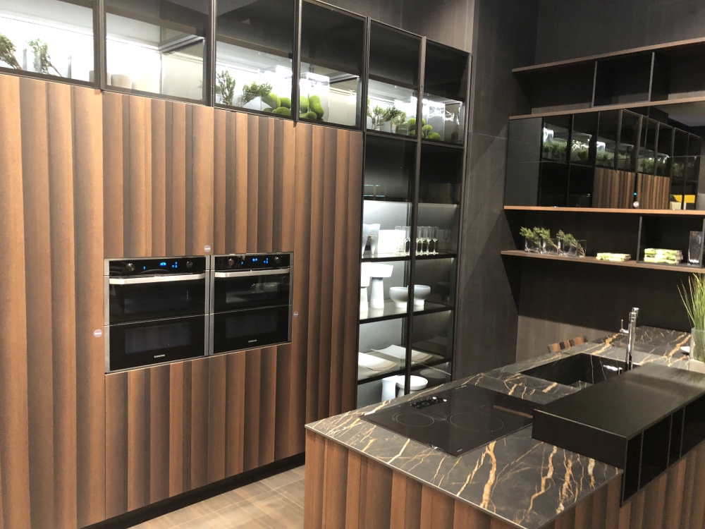 Stainless Sink Embedded Into a Dark Veined Countertop