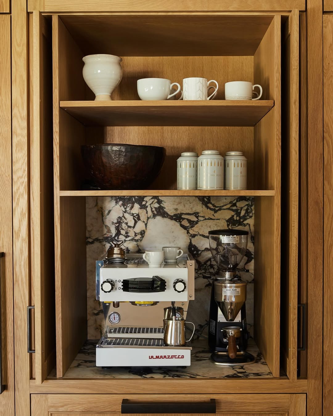 A built-in coffee garage designed like a cabinet niche