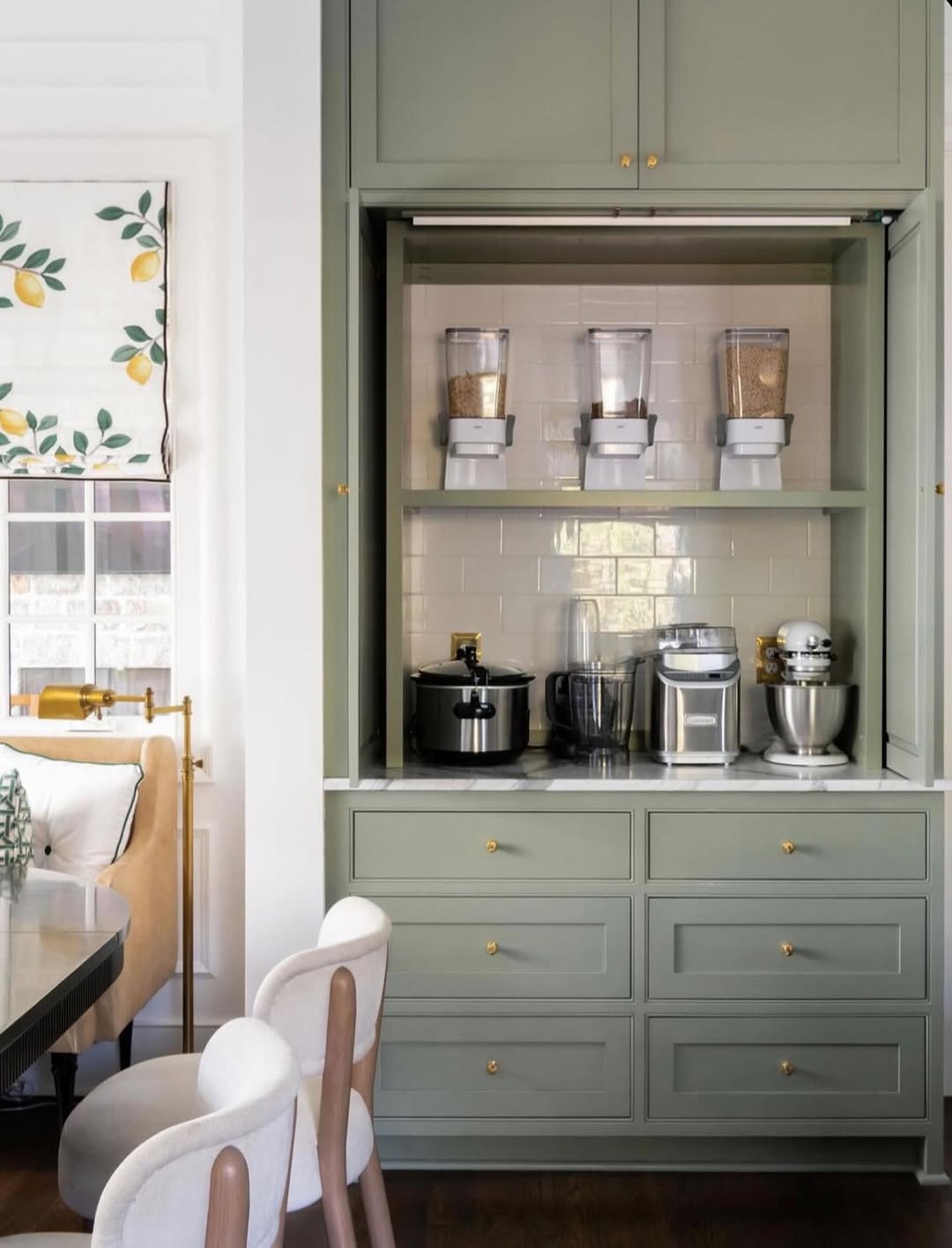 A compact appliance garage for a daily tea setup