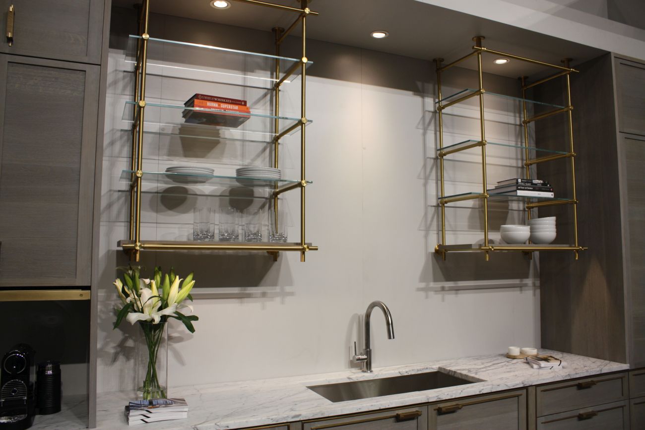 Glass shelves paired with cabinetry instead of replacing it entirely